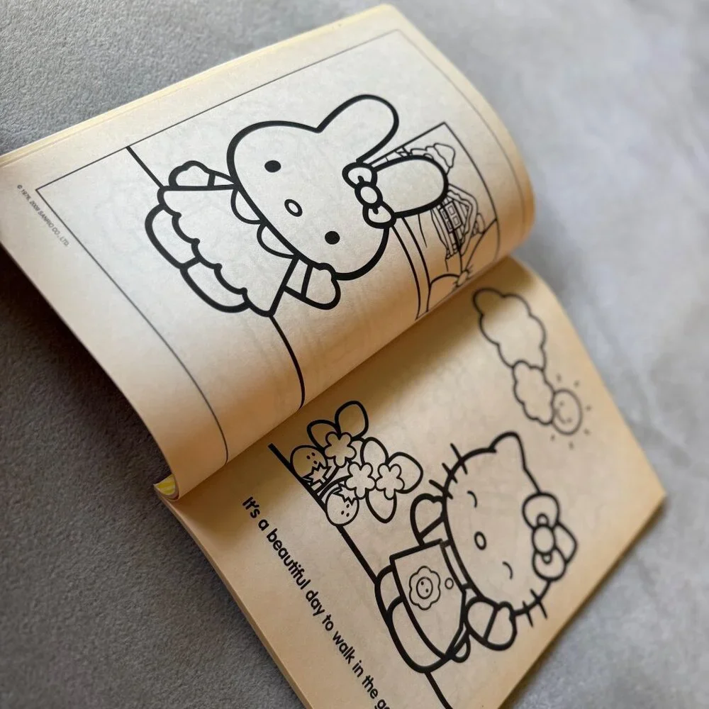 2009 New‎ NOS Sanrio Hello Kitty coloring activity book/paper doll